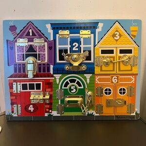 Like New Melissa & Doug Latches Board